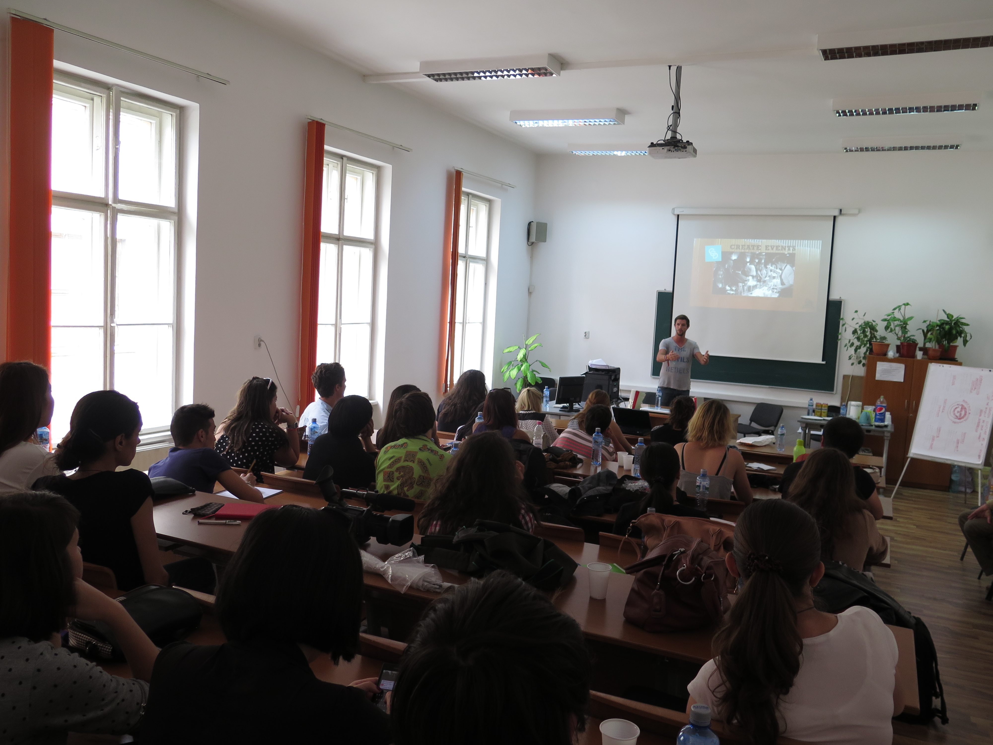 The Backpacker Intern giving a presentation at the University of Transylvania